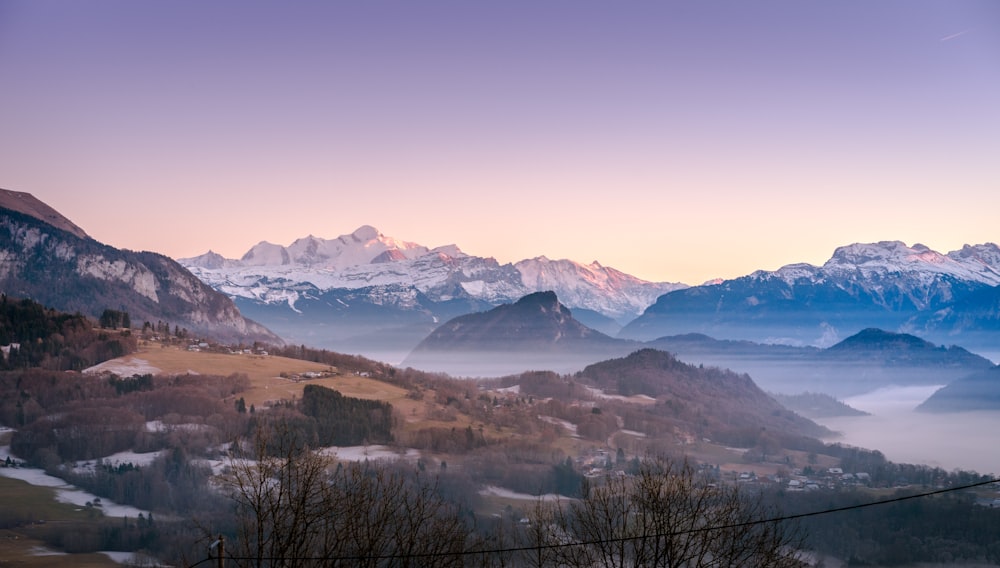 panoramic photography of fog mountain