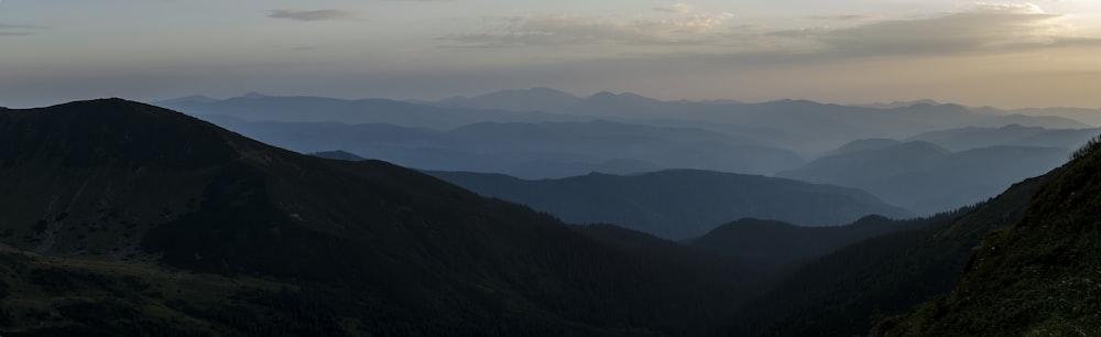 mountain range during foggy day