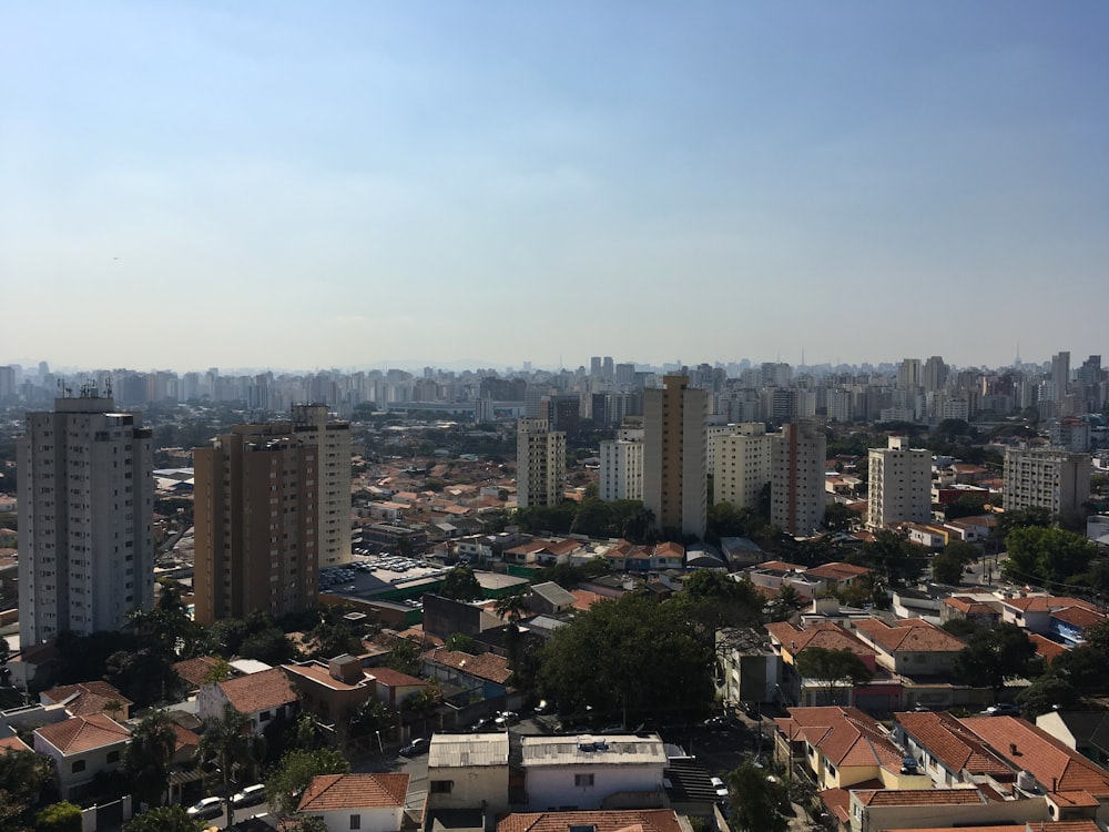 aerial photo of buildings under blue sky at daytime