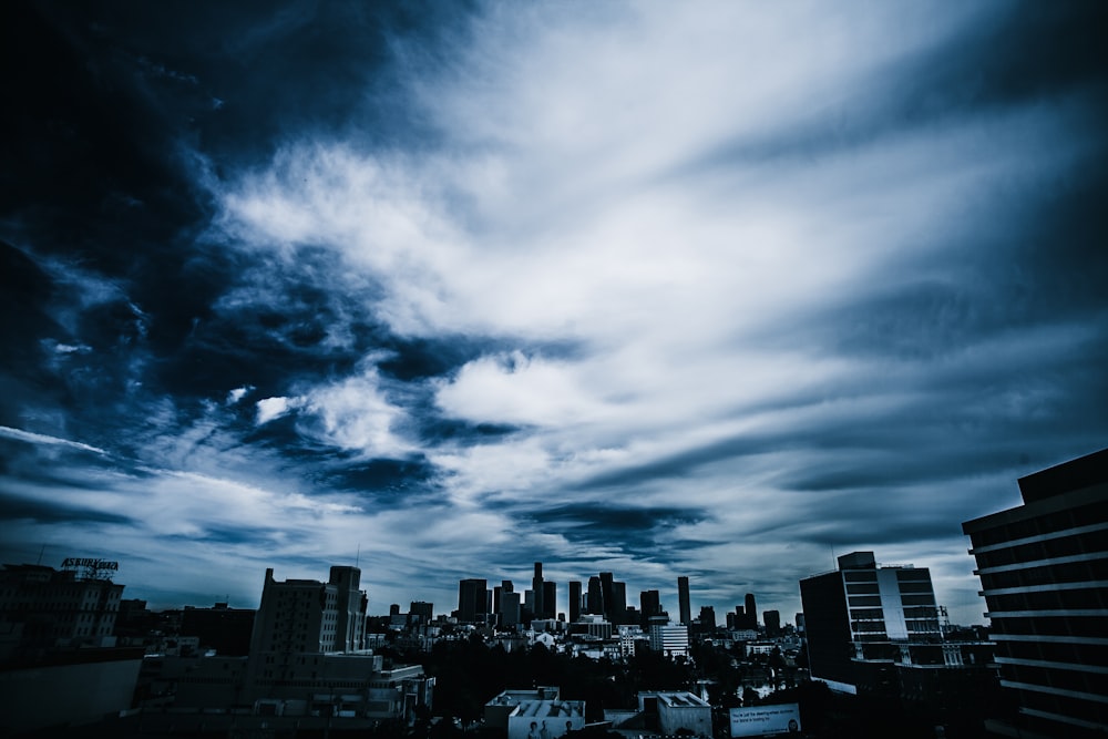 city building under black sky