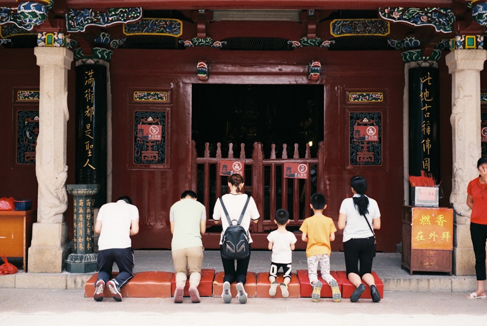 six people kneeling