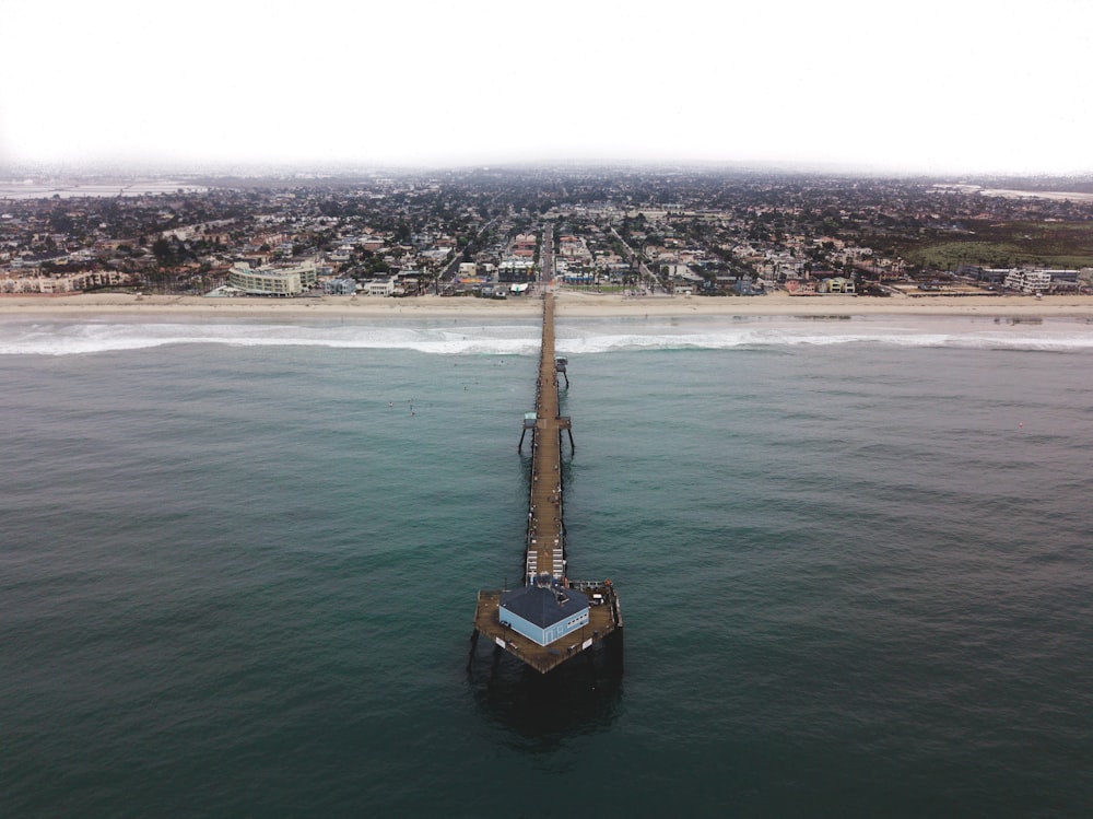 brown wooden port on body of water