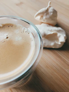 A close-up of a specialty coffee served in a cookie cup.