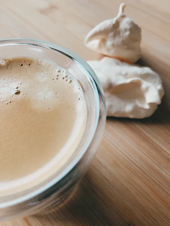 A close-up of a specialty coffee served in a cookie cup.