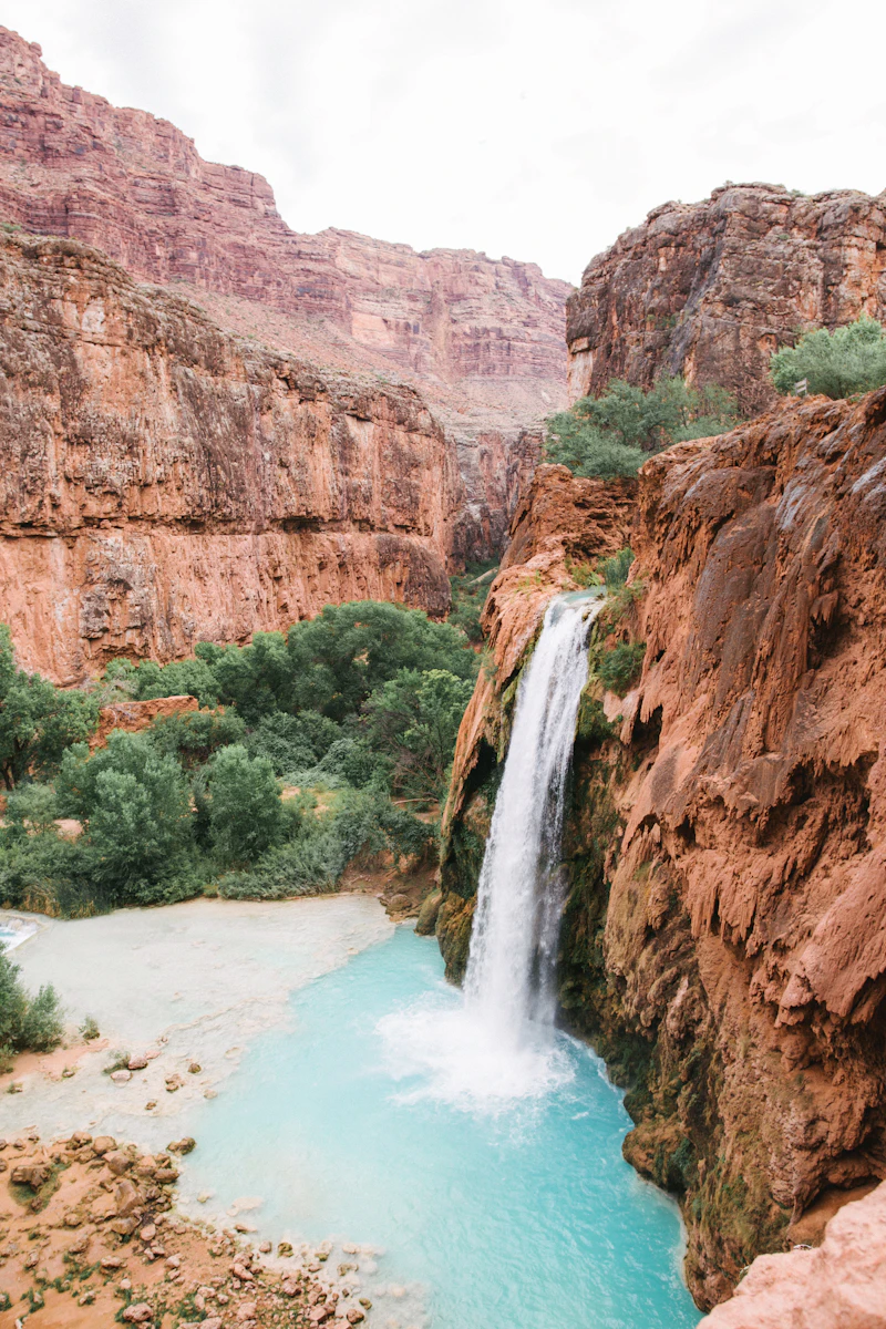 Red rock canyon with waterfall in the American Southwest