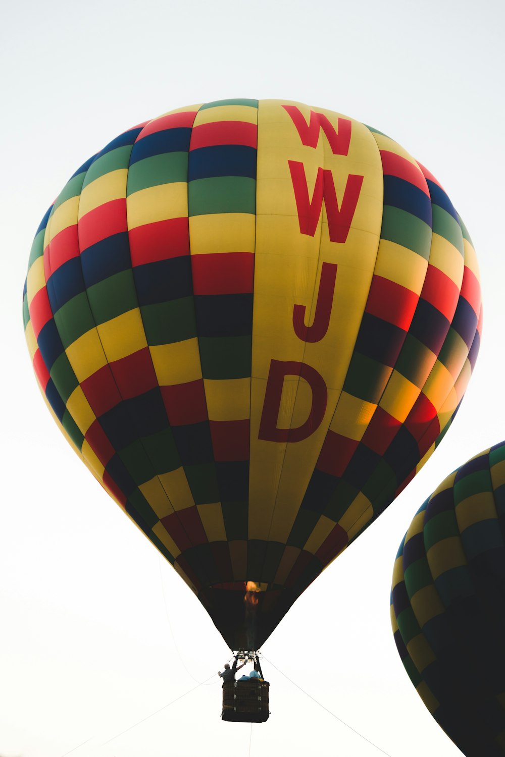 man riding on hot air balloon