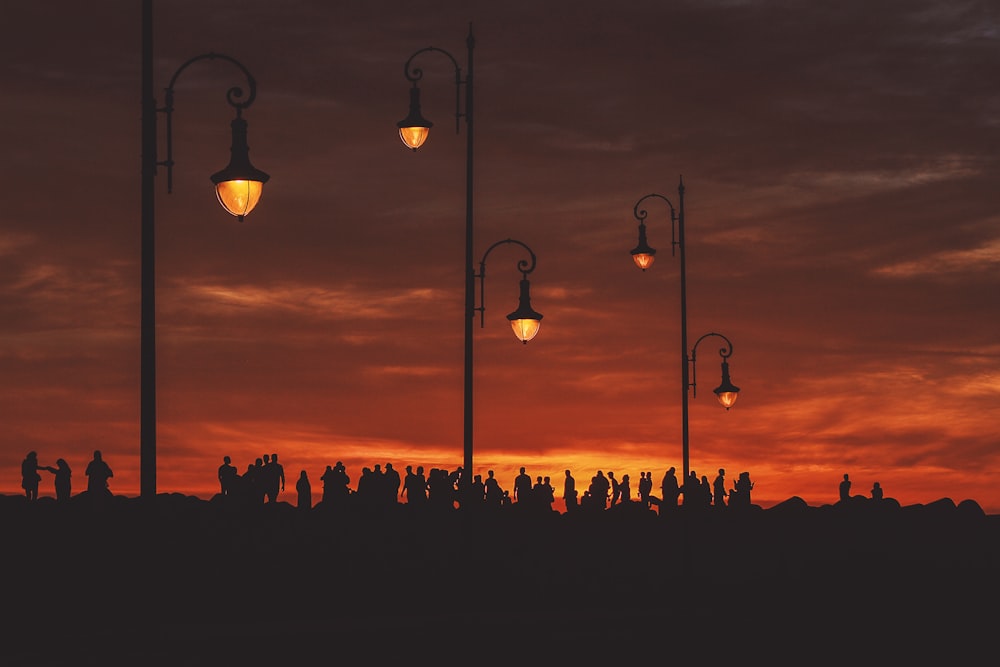 group of people at sunset