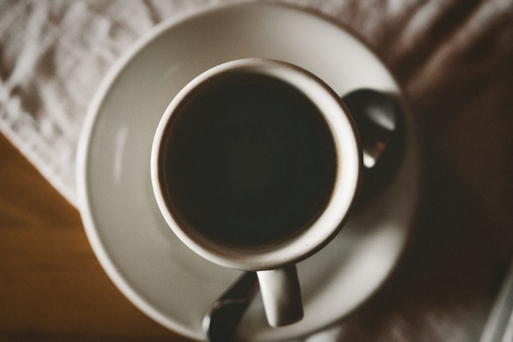 white ceramic mug in flat lay photography