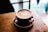 latte art in brown cup in macro photography