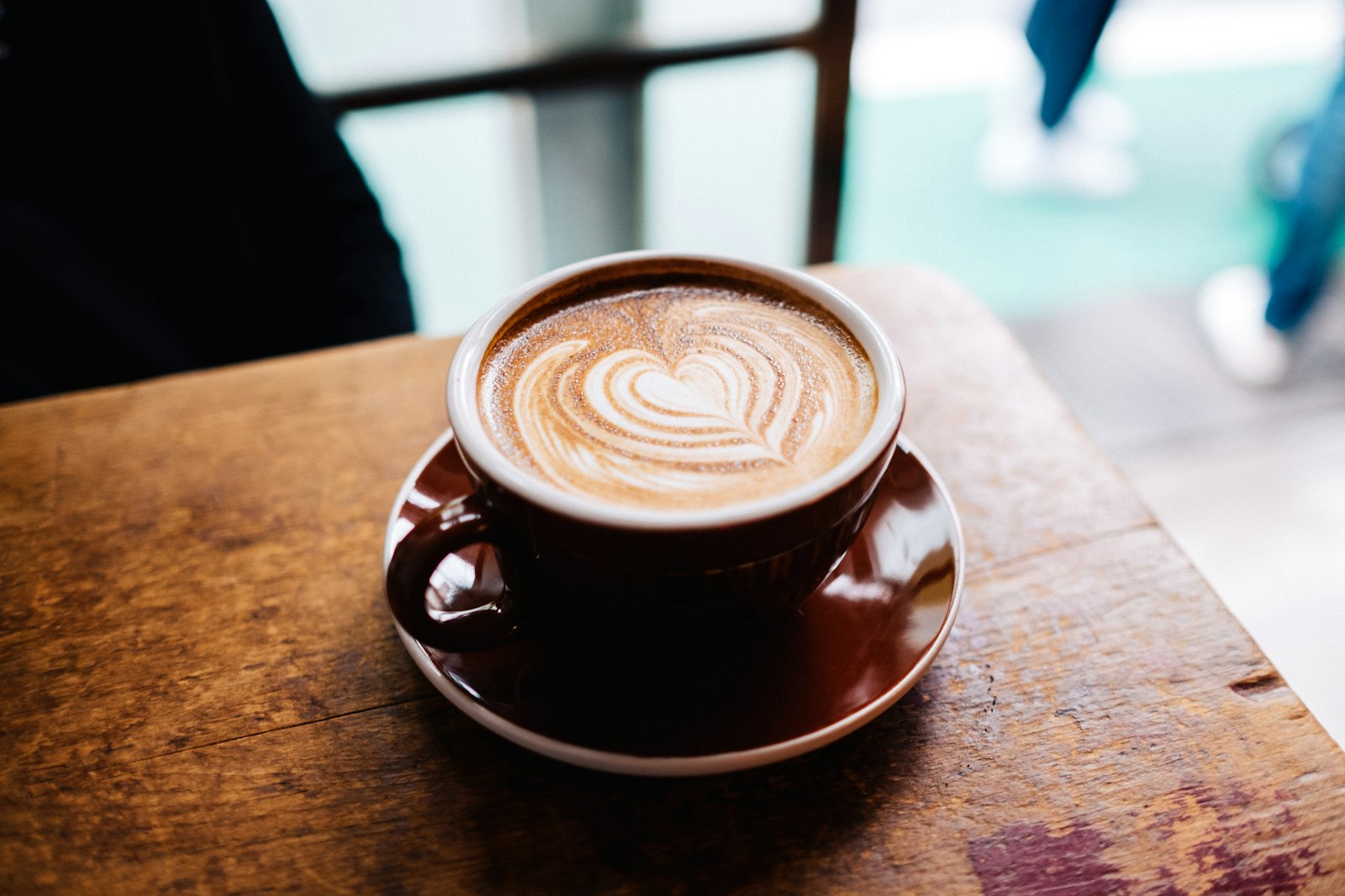 Fujifilm XF 23mm F1.4 R sample photo. Latte art in brown photography