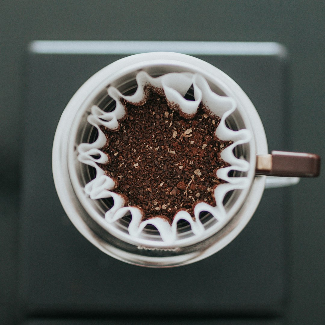 brown powder in white container