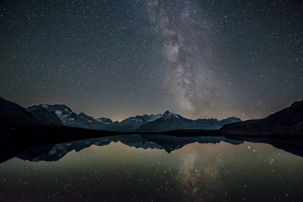 mountain near body of water