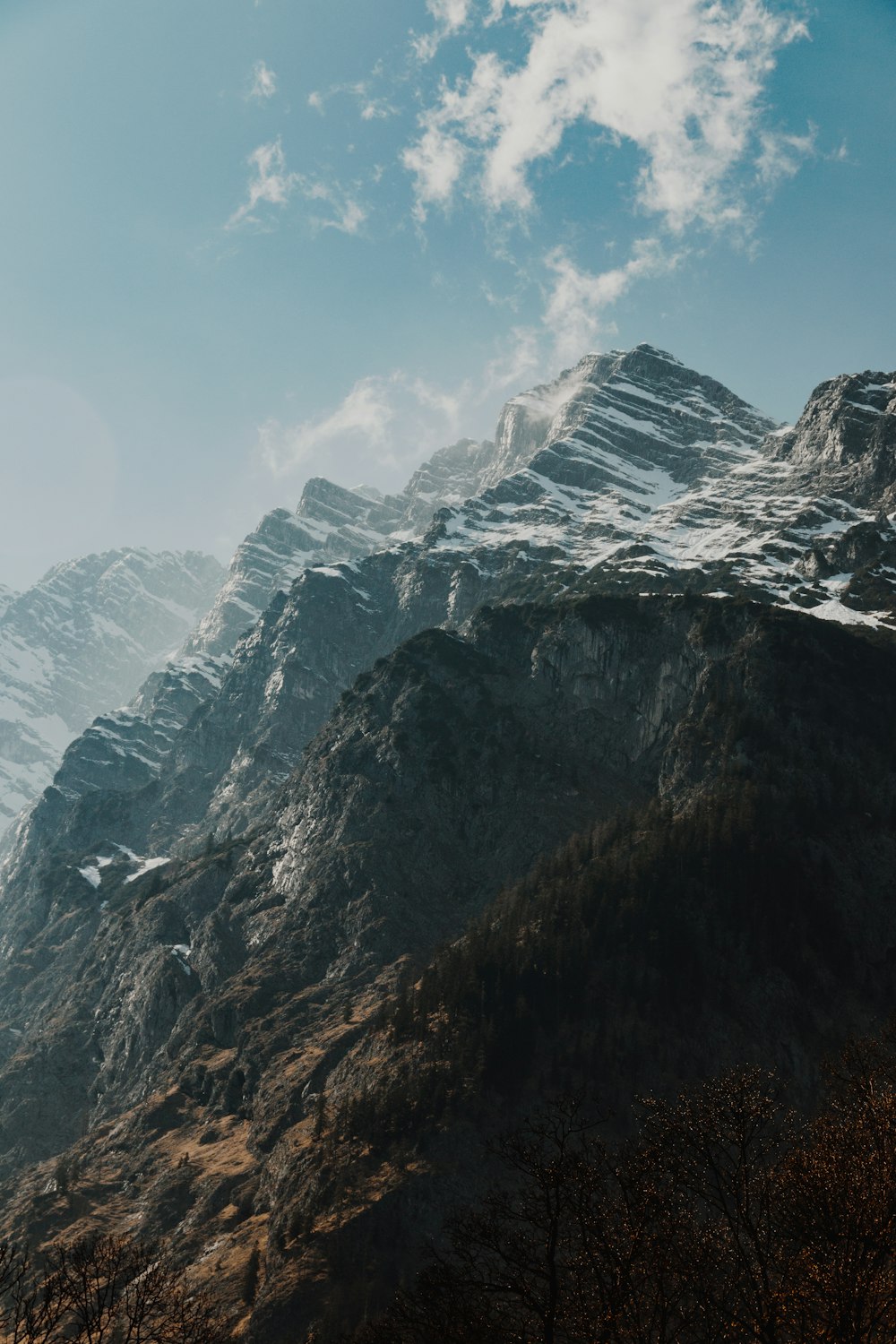 snow covered mountain during daytime