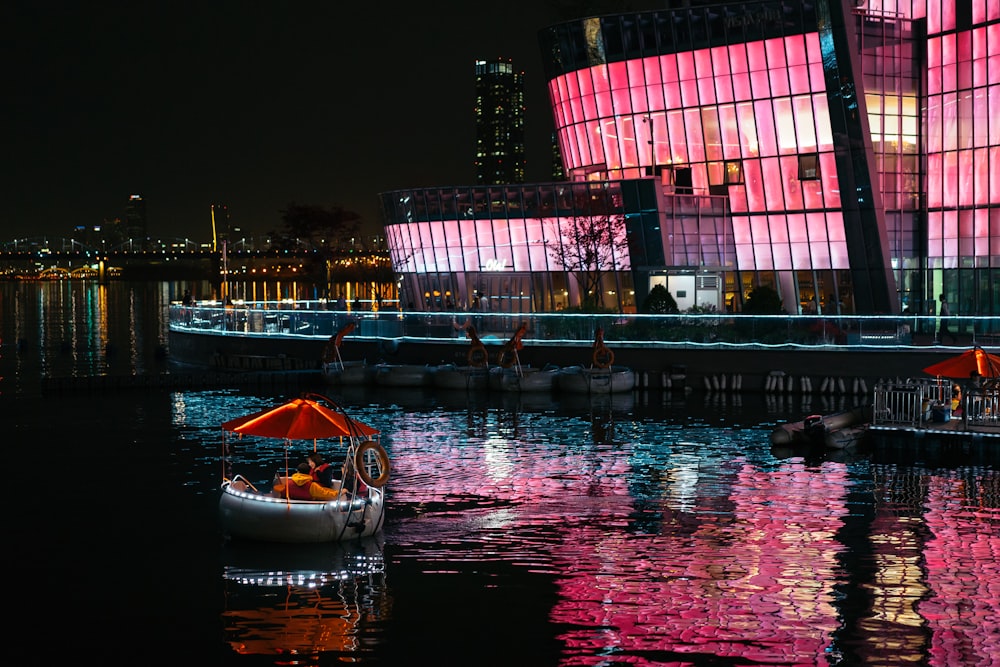 boat on water with umbrella