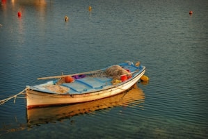 A small fishing boat ready for an adventure on the water.