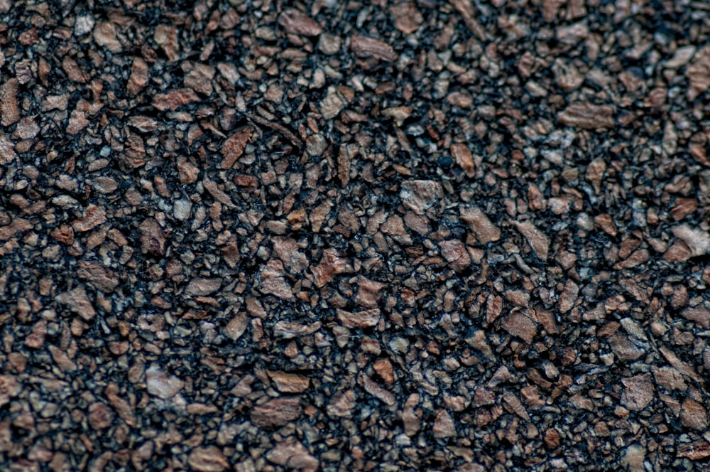 a close up of a black and brown textured surface