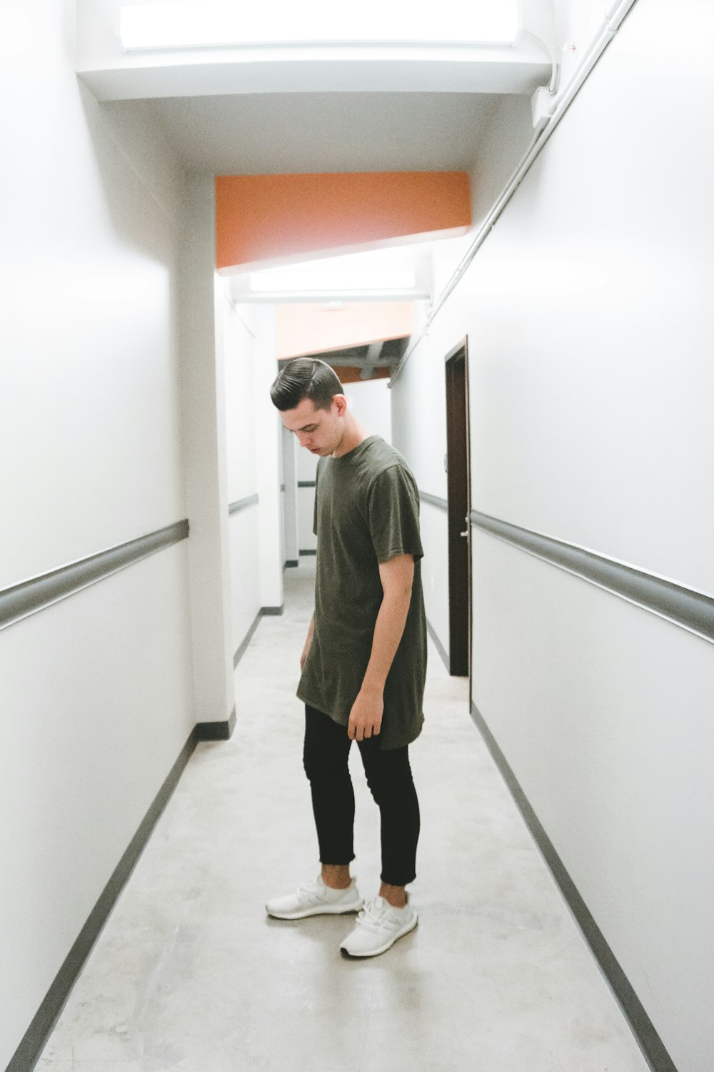 man standing on hallway