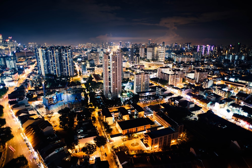city with high-rise buildings during night time