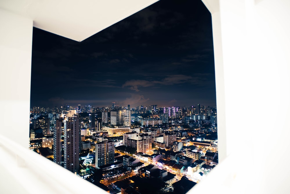 high rise buildings at night time