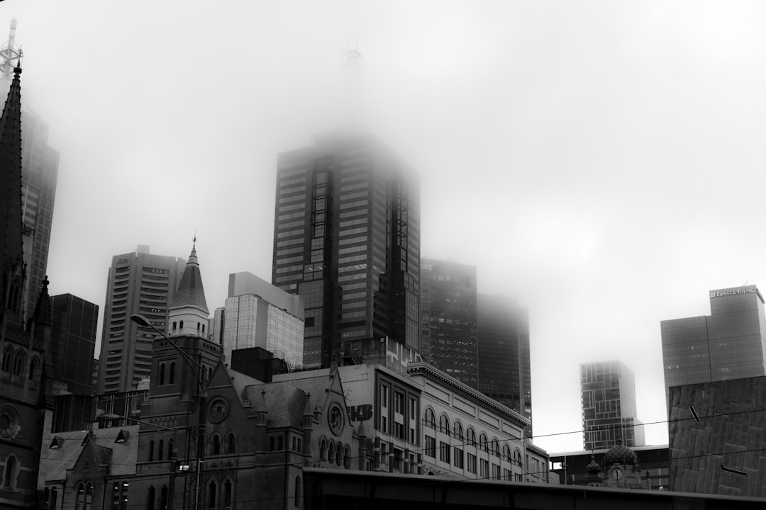 grayscale photo of black and white concrete building, Foggy Melbourne