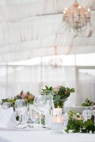 clear long-stem wine glasses on table
