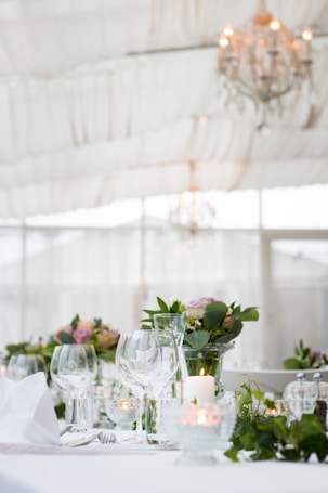 clear long-stem wine glasses on table