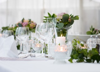 clear long-stem wine glasses on table