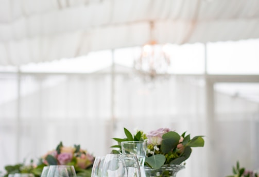 clear long-stem wine glasses on table