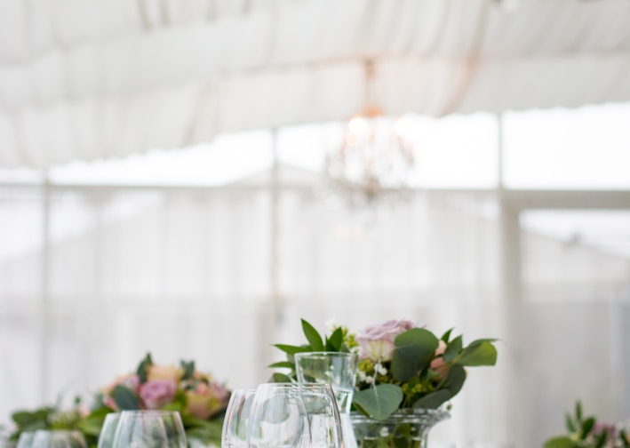 clear long-stem wine glasses on table