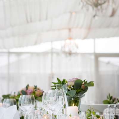 clear long-stem wine glasses on table