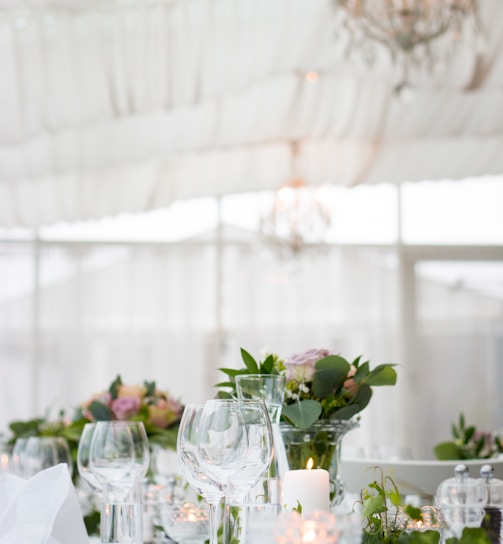 clear long-stem wine glasses on table