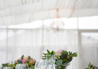 clear long-stem wine glasses on table