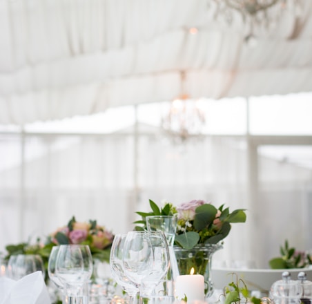 clear long-stem wine glasses on table