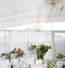 clear long-stem wine glasses on table