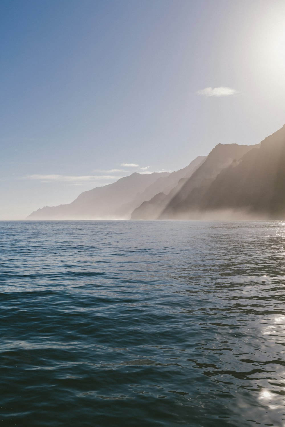 body of water and mountains