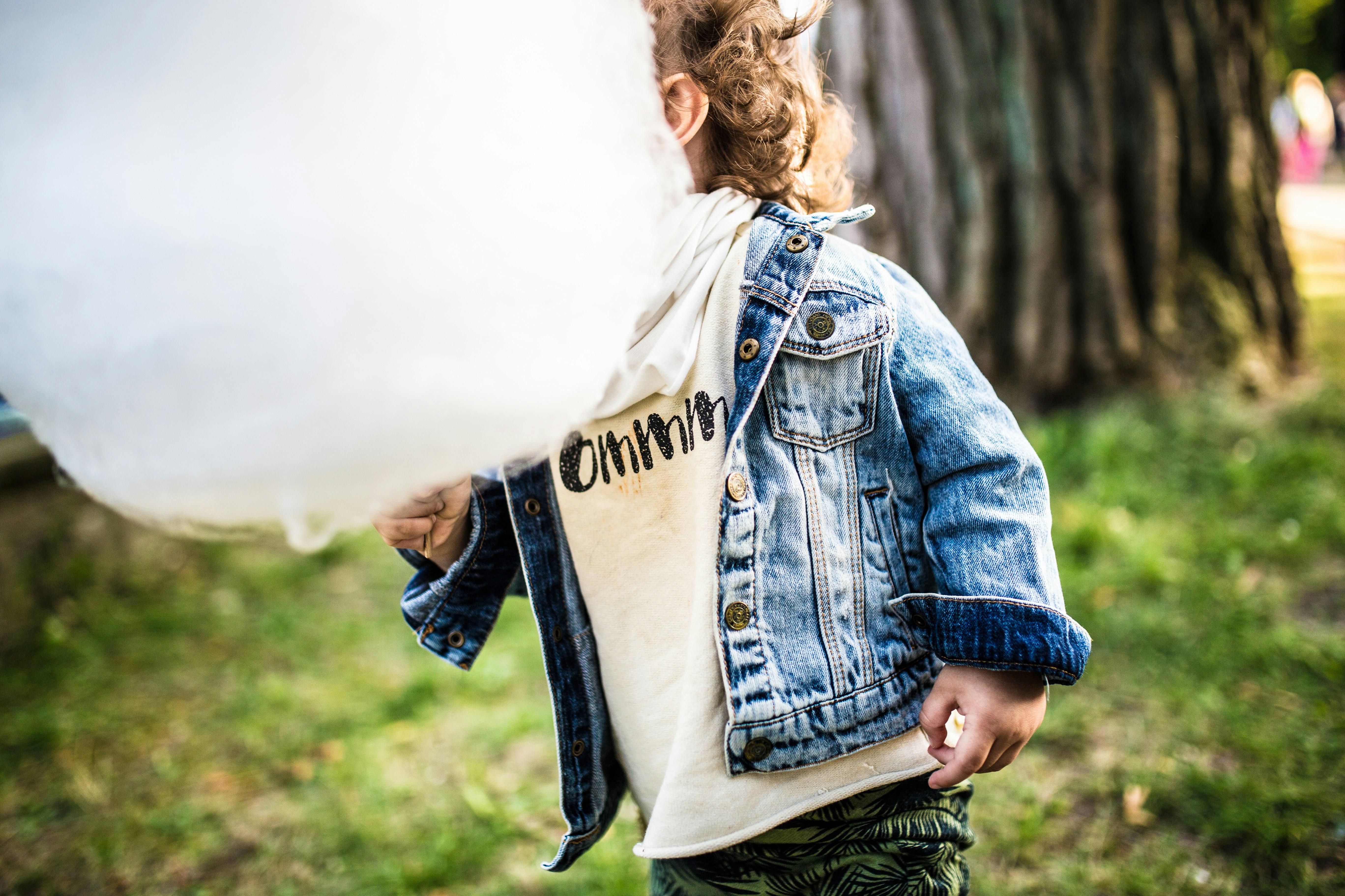 baby wearing blue denim jacket