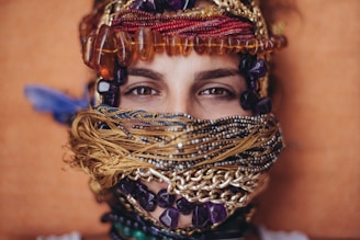 shallow focus photography of woman covered of accessories