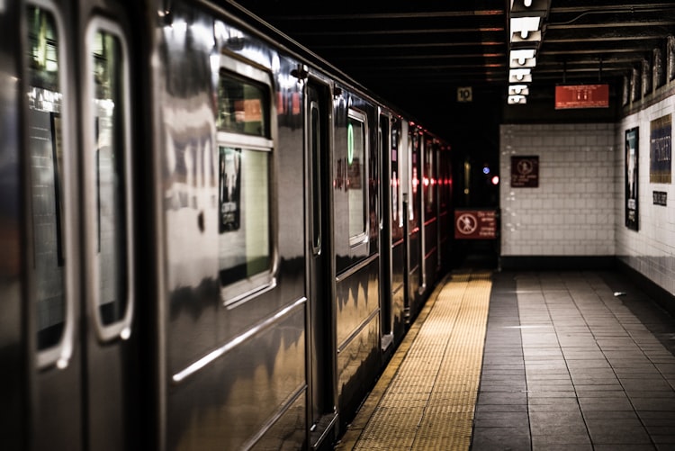 A subway train parked in a station