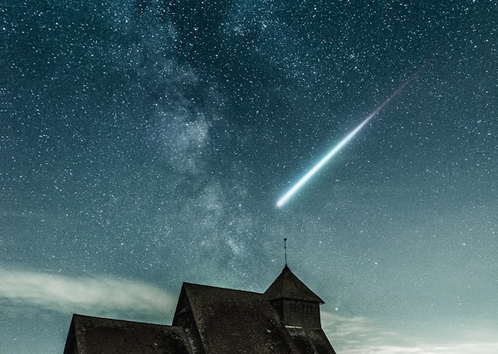 brown house under stary night