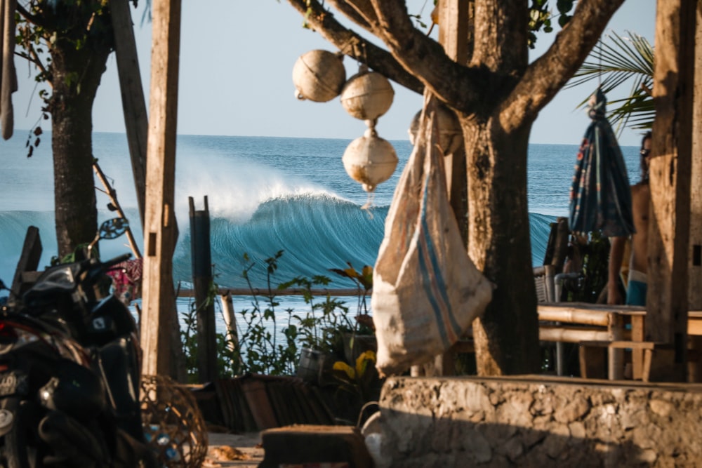 cottage near ocean waves during daytime