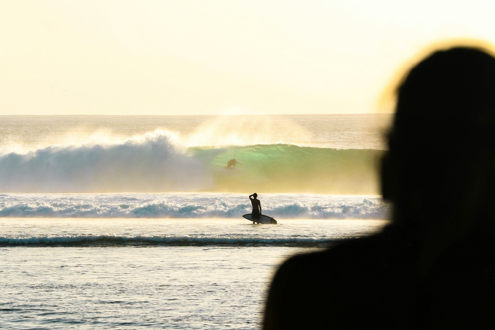 Canon EOS 7D Mark II + Canon EF 70-200mm F2.8L IS II USM sample photo. Person holding white surfboard photography