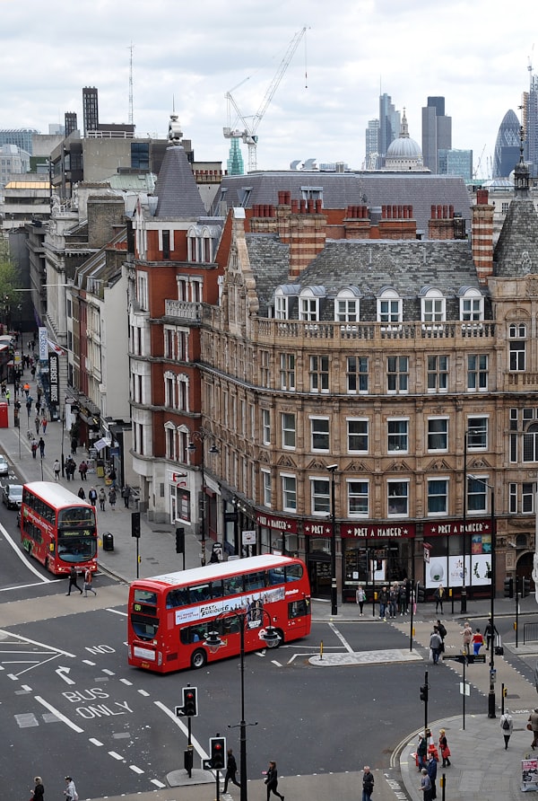 City street with buses and cars in motion