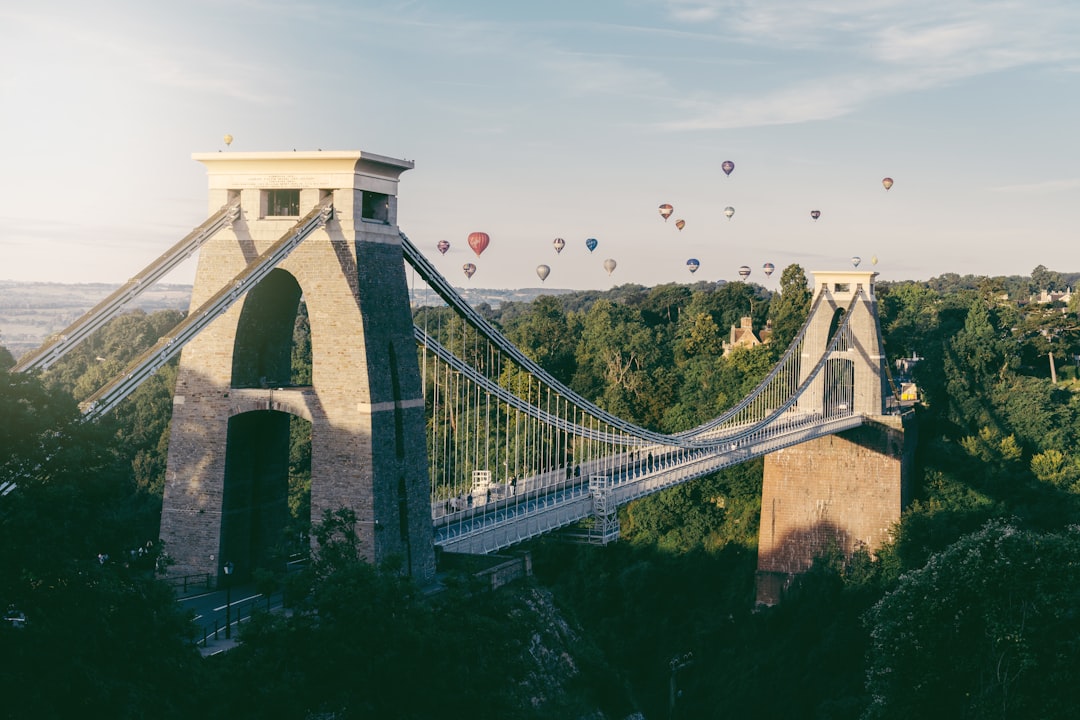 hot air balloons flying above trees, Balloons over the bridge