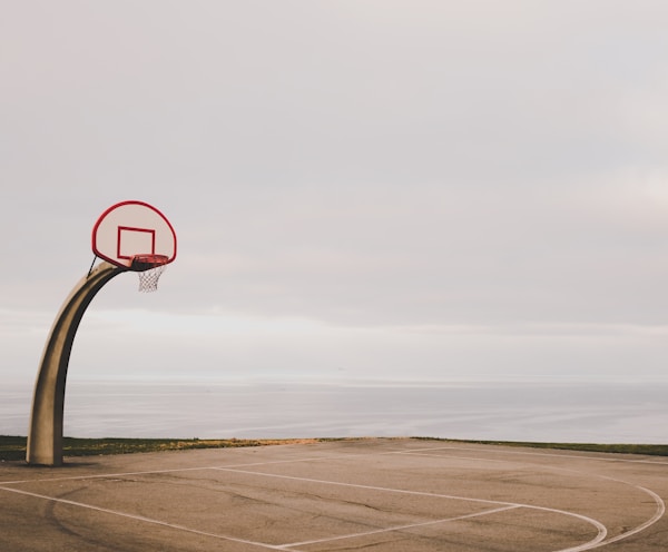 basketball court near body of water
