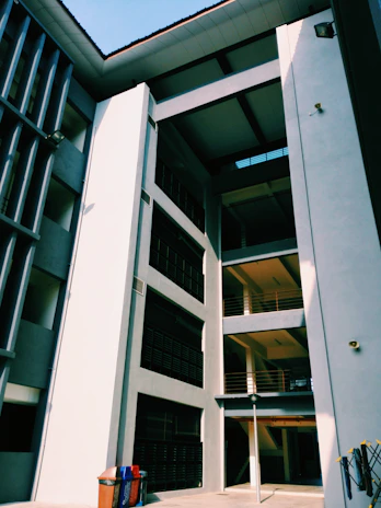 A sleek, modern recycling facility with clean lines and eco-friendly design elements.