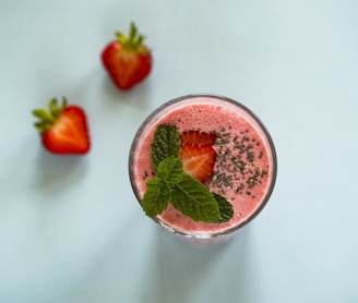 strawberry juice on white surface