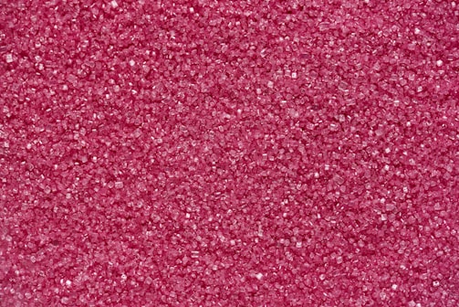 Diamond powder granules shining under microscope lighting