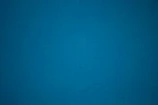 Blue navy abstract background with subtle texture conveying stability and trust.
