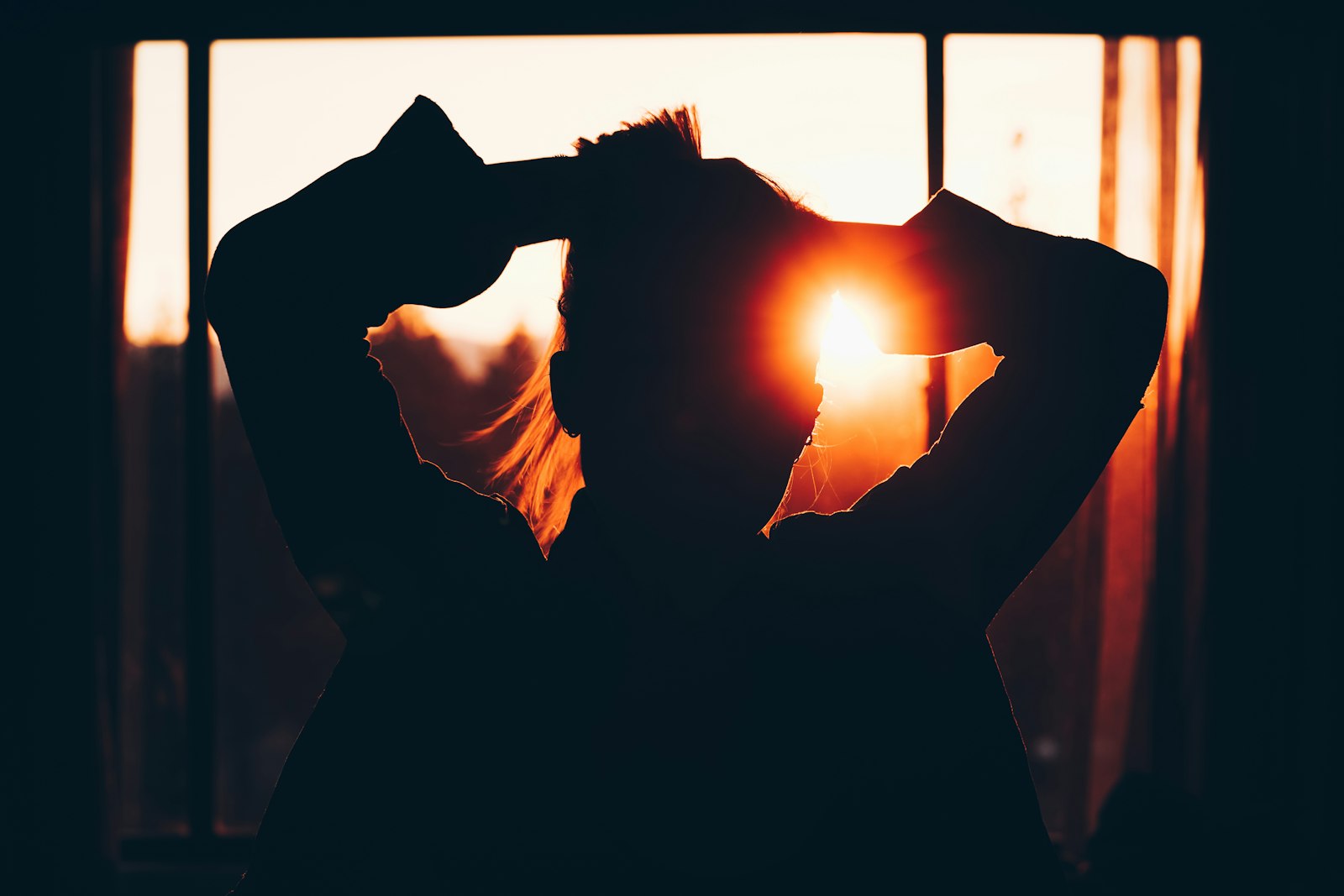 Sony a9 sample photo. Silhouette of woman holding photography