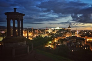 Historic monument of Petrolina bathed in warm orange light during dusk.